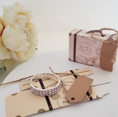 Child size bracelet in a suitcase gift box